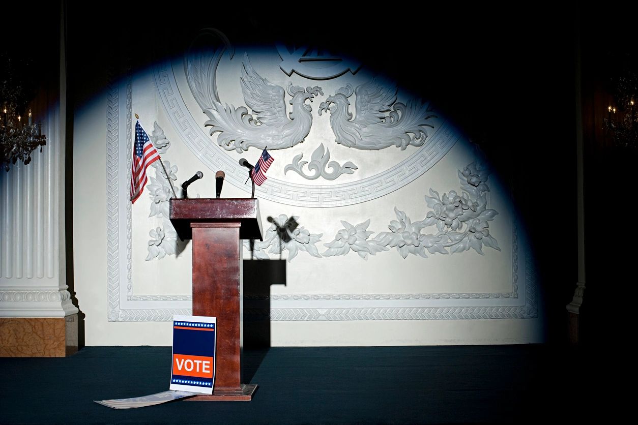 Podium and Voting Sign